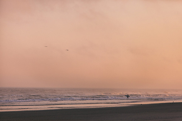 Solo Paddle-Out by a Lone Surfer at the North End of Wrightsville Beach, NC